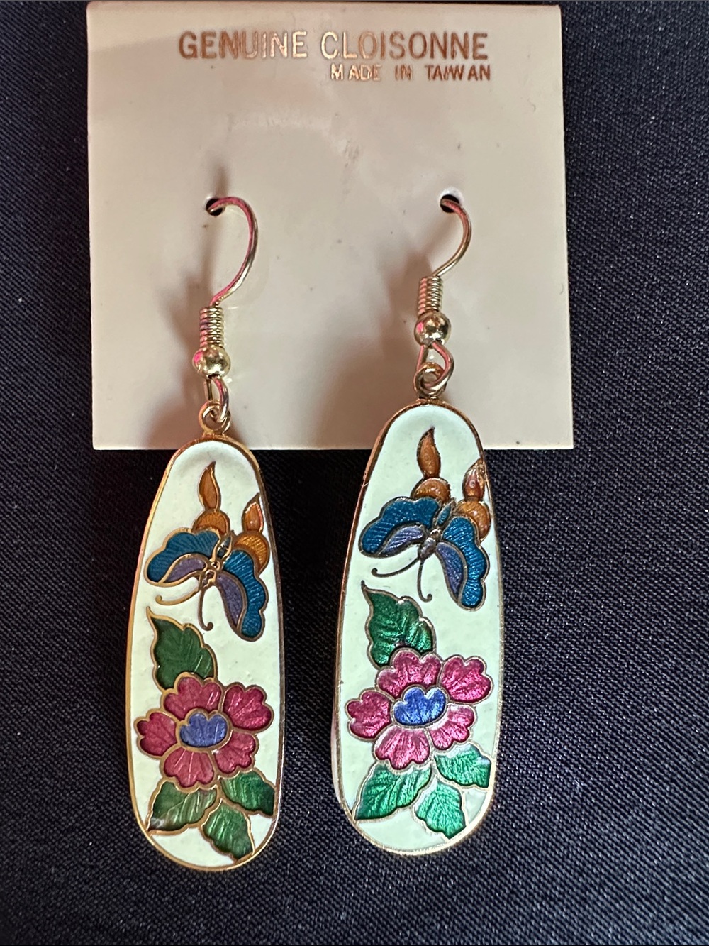 Cloisonné EUC earrings. Elongated drop w/ butterfly & flower in cream enamel